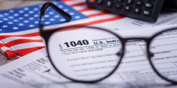 Trump tariffs 2025: Income tax with instruction, money, calculator and glasses. Tax payment and filing concept