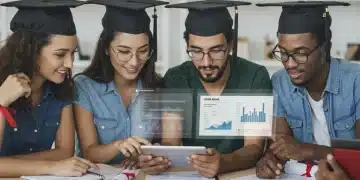 Students reviewing student loan documents and financial projections on a tablet